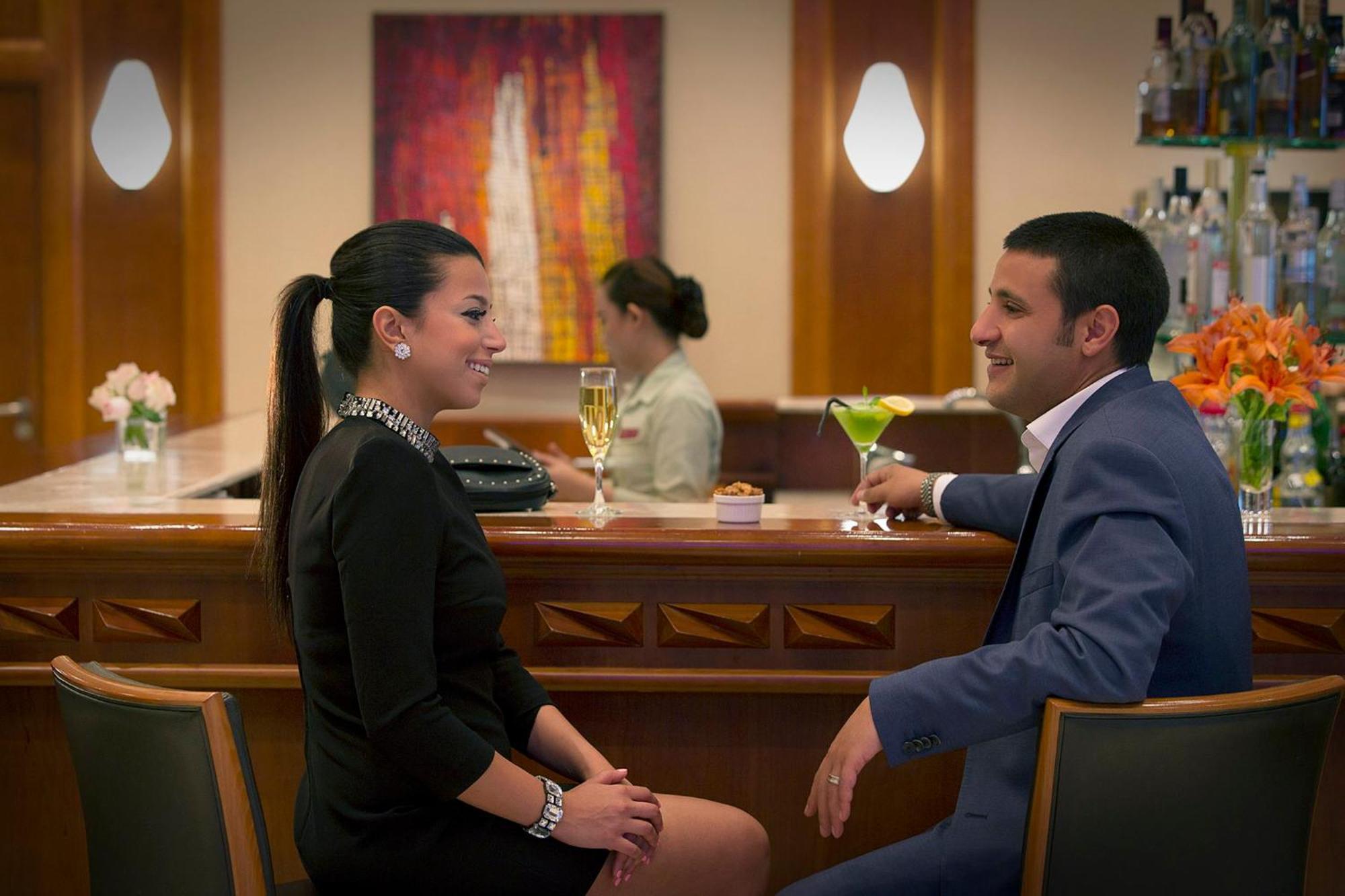 Crowne Plaza Jordan Dead Sea Resort & Spa By Ihg Sweimeh Esterno foto A couple at the bar